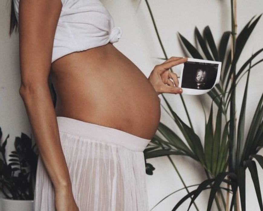 Illustratie bij: Tijdens je zwangerschap kom je gemiddeld 12 kilo aan, met een tweeling 20 kilo